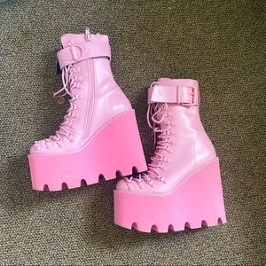 Doll’s Kill Pink Platform lace up boots